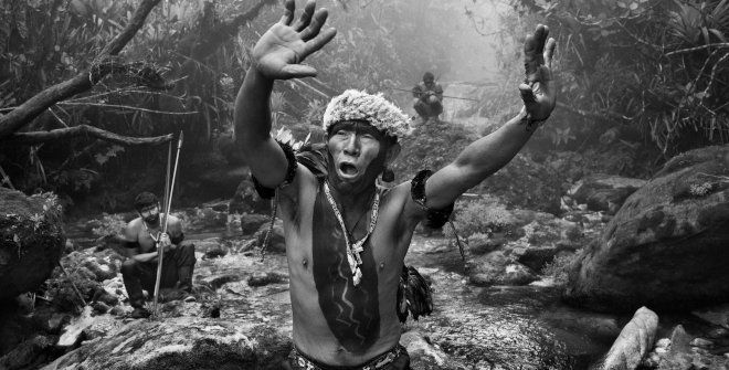 © Sebastião Salgado. Yanomami shaman interacts with spirits before an ascent to Pico da Neblina. State of Amazonas, Brazil, 2014